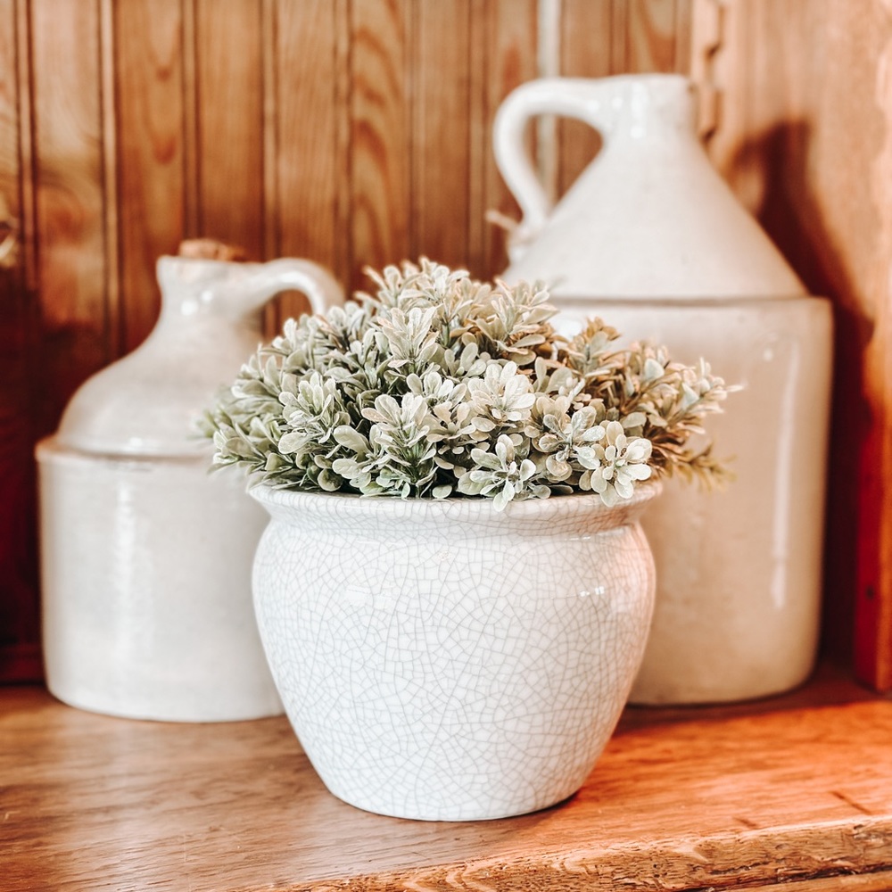 Gray and white glossy planter.
